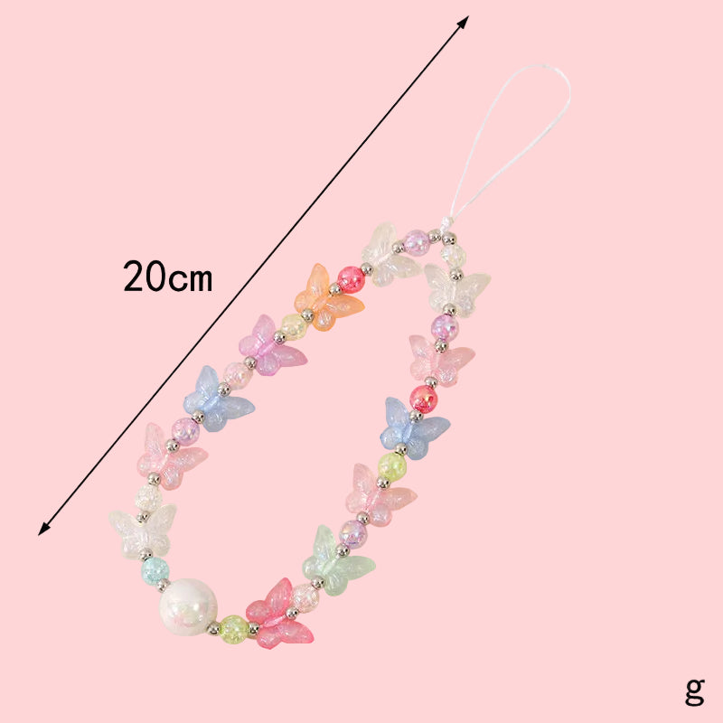 Pastel butterfly and pearl beaded strap, 20cm long, with silver spacers and a white loop.