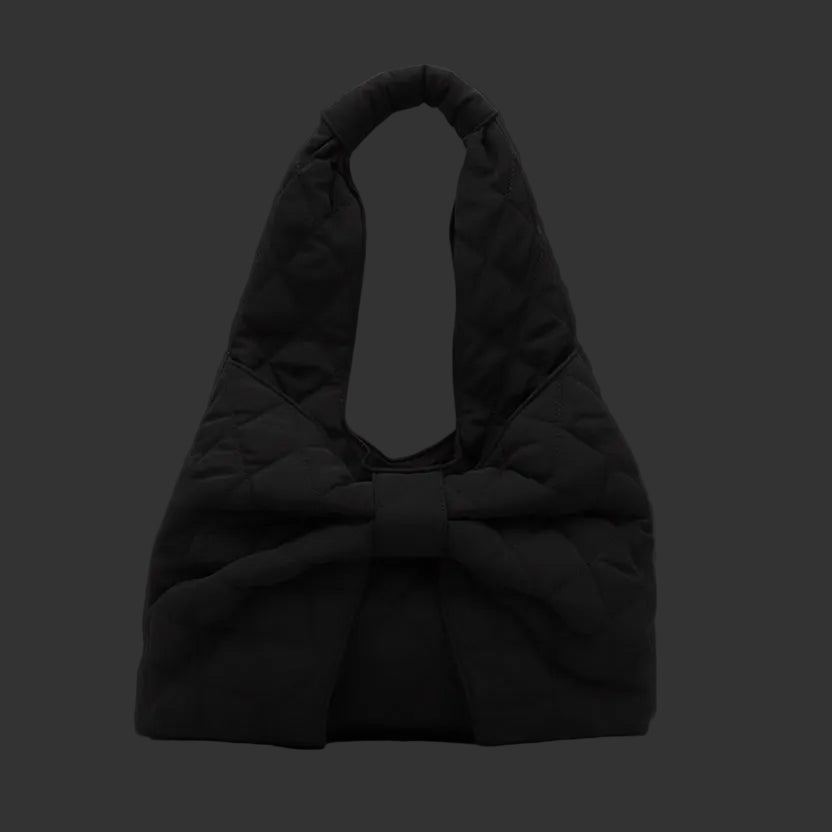 Black shoulder bag with a large decorative bow detail on the front, featuring a soft, puffy texture.