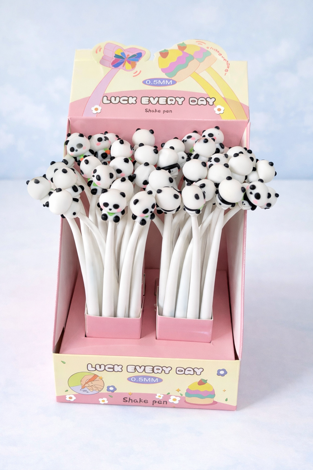 Novelty panda pens by Random Style, displayed in a pink and yellow point-of-sale display box.