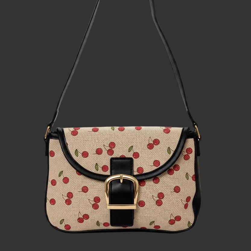 Small cherry print, black trim and strap, and gold buckle closure; available in black and red.