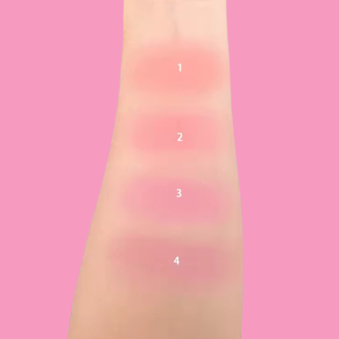 Four shades of blush and lip stain applied on a hand.