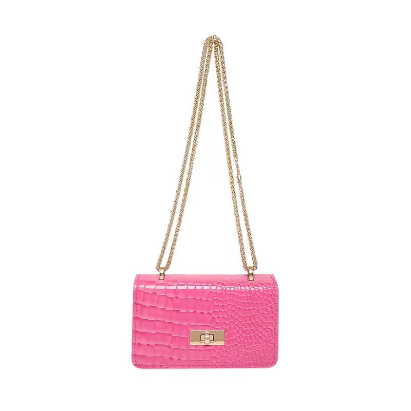 Pink crocodile-embossed shoulder bag by Melloworld with a gold chain strap and gold clasp.