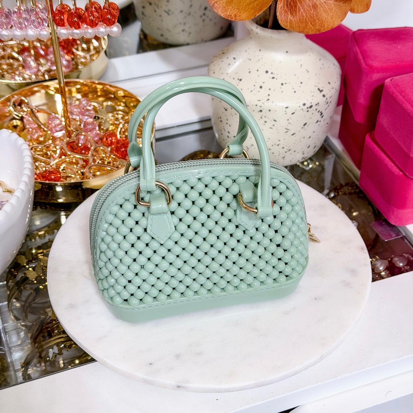 Mini beaded dome chain bag, in mint green, with an allover beaded pattern and gold-tone hardware.
