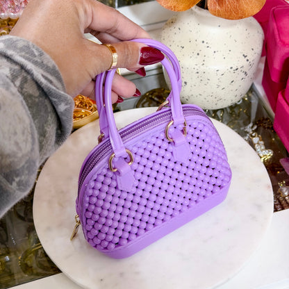 Lilac mini beaded dome chain bag with gold-tone hardware.