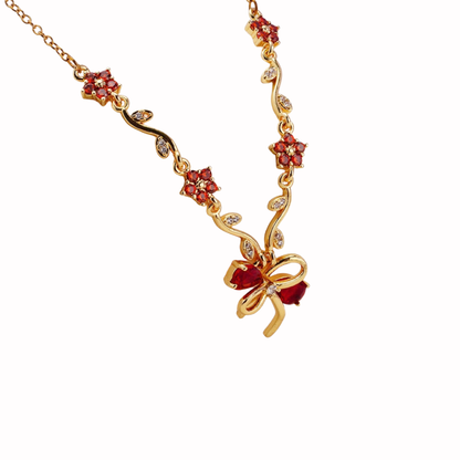 Crystal Bow & Floral Vine Pendant Necklace