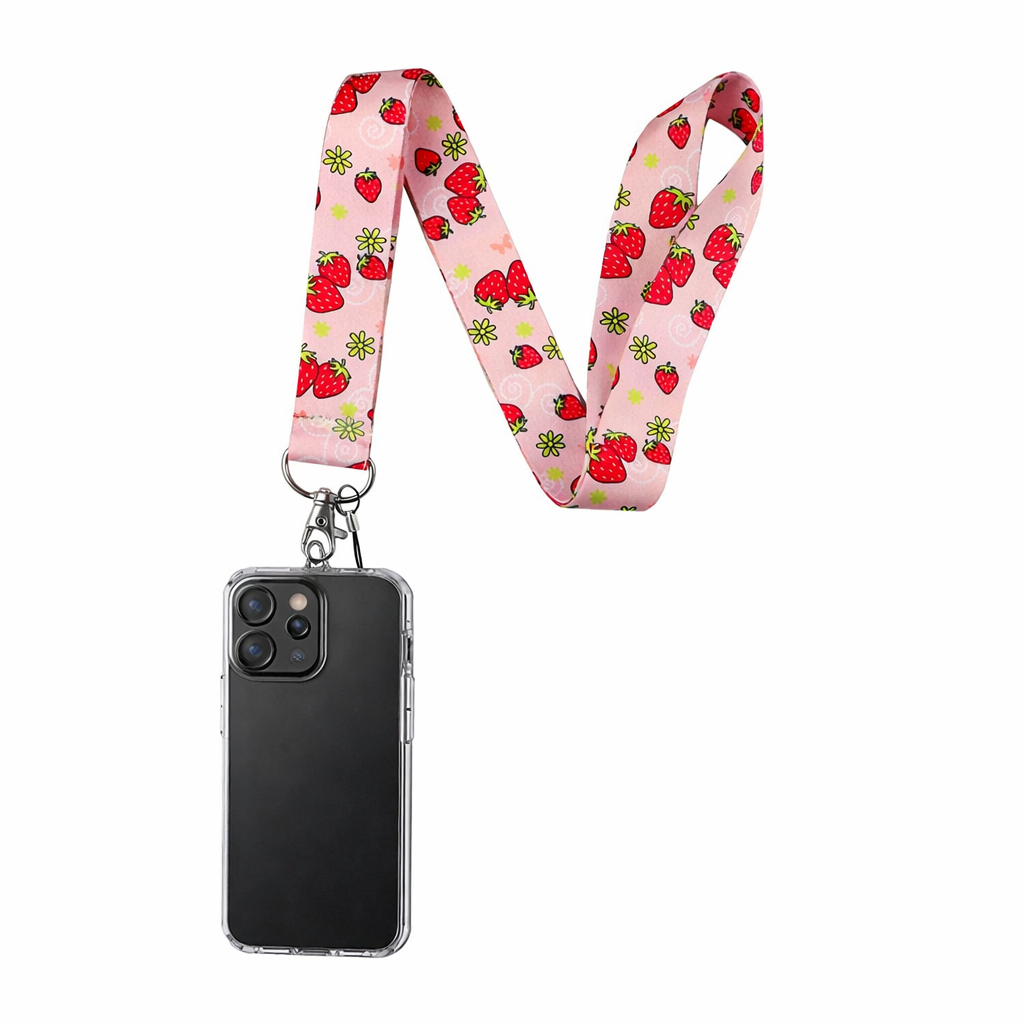 Pink phone lanyard with strawberry and flower pattern, connected to a black smartphone in a clear case.