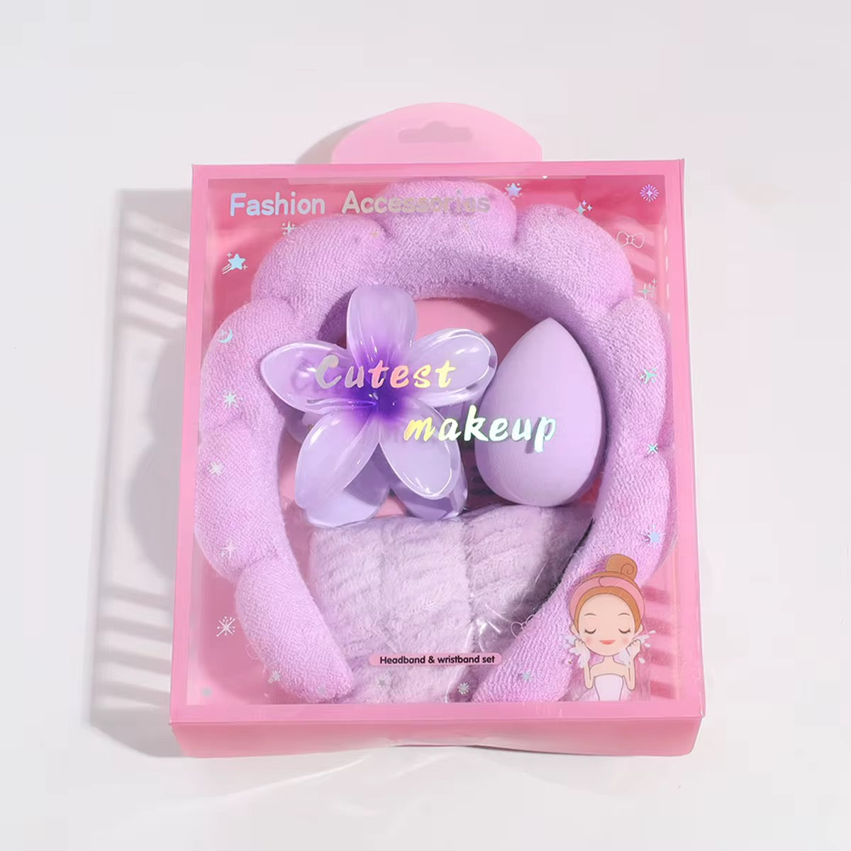 Pink headband with flower and makeup sponge in packaging on a white background