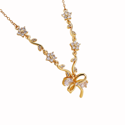 Crystal Bow & Floral Vine Pendant Necklace