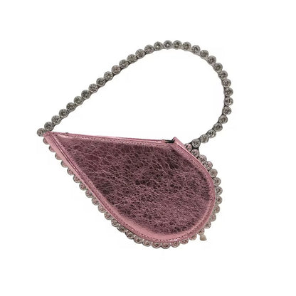 Pink evening handbag featuring rhinestone trim and a crystal top handle.