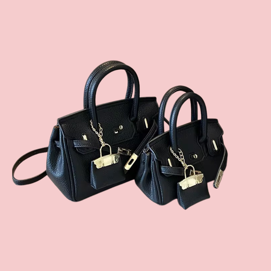 The Luxe Lock Crossbody Bag