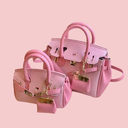 The Luxe Lock Crossbody Bag
