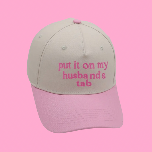 Put It On My Husband’s Tab Trucker Hats