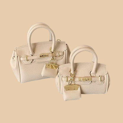The Luxe Lock Crossbody Bag