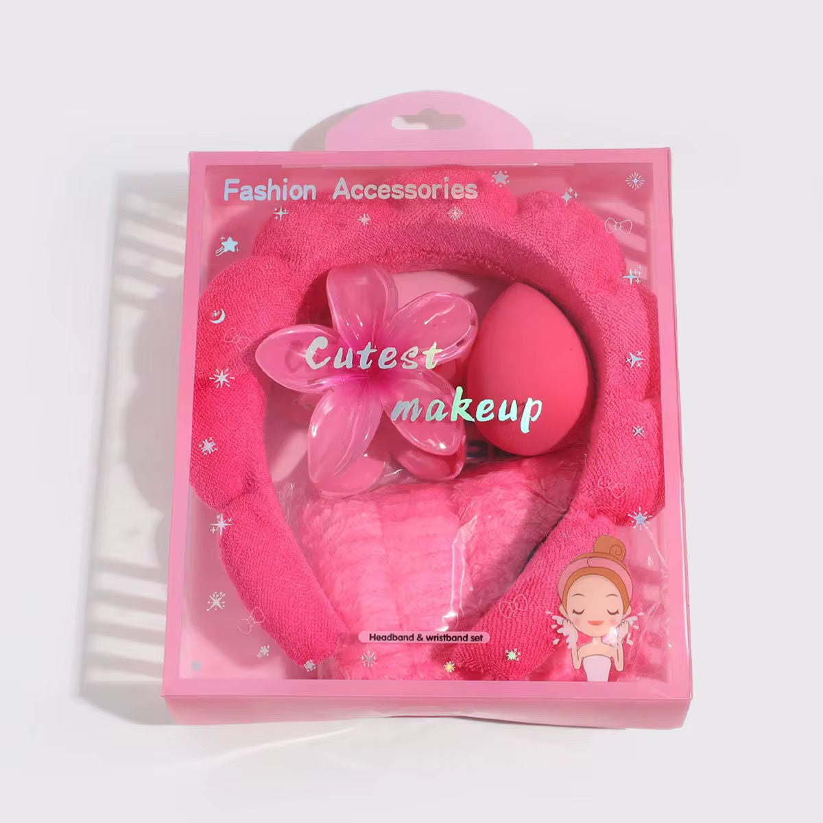 Pink makeup set with headband and sponge in packaging labeled 'Fashion Accessories' and 'Cutest makeup'.