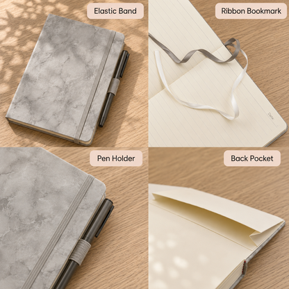 Gray marble-patterned journal with elastic band, ribbon bookmark, and pen holder, shown in lifestyle close-ups on wooden surface