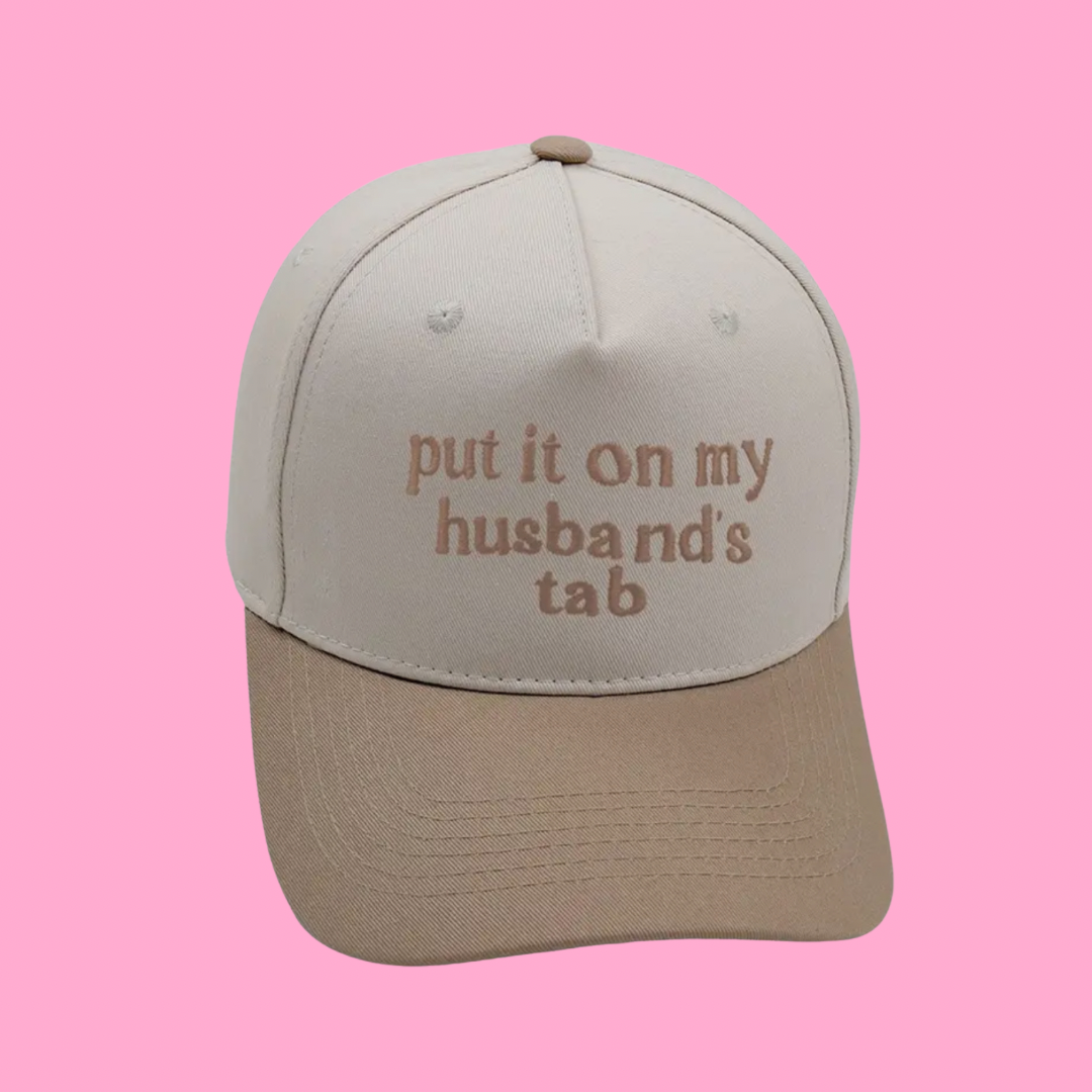Put It On My Husband’s Tab Trucker Hats