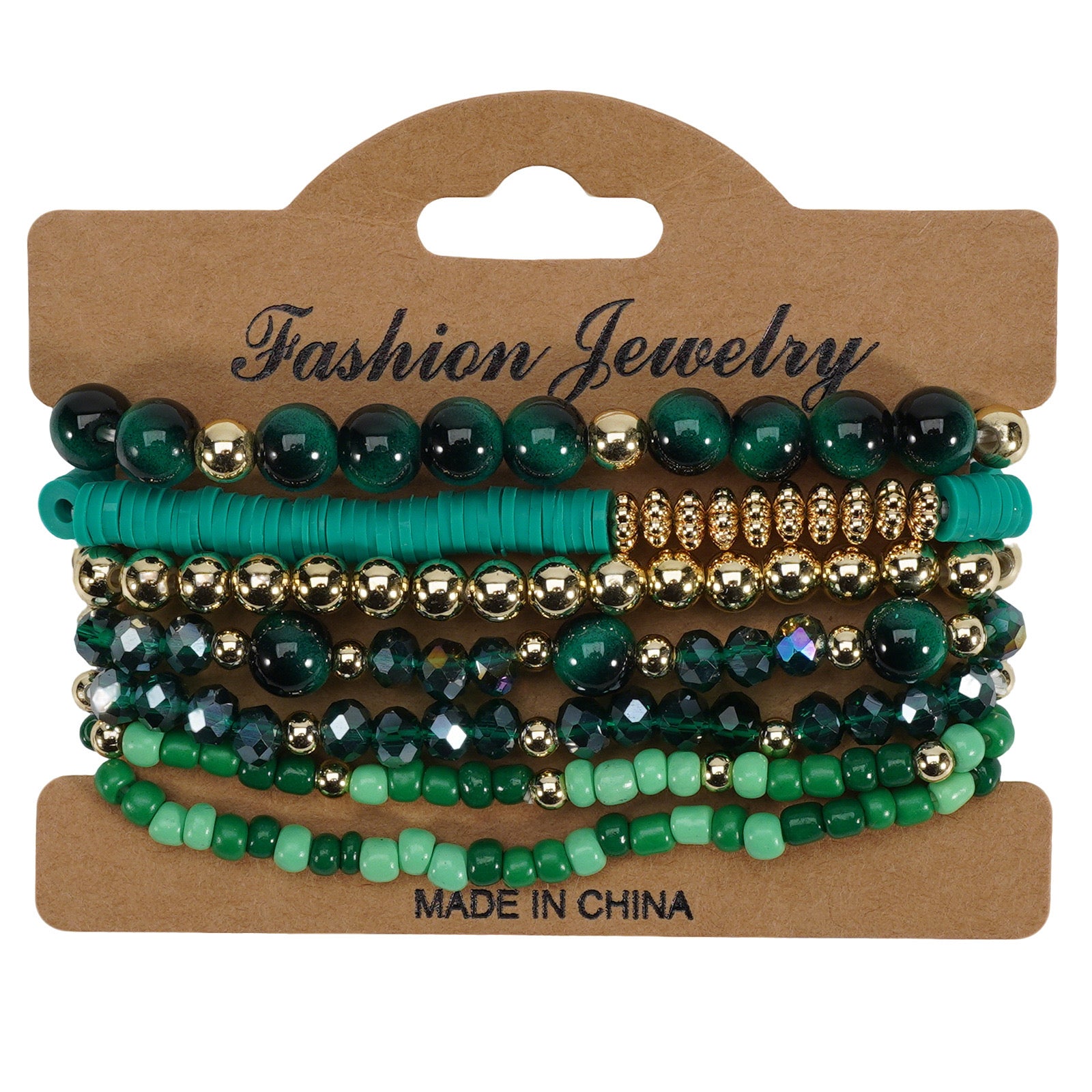 Bohemian style layered bracelets with various green and gold beads displayed on a kraft tag.