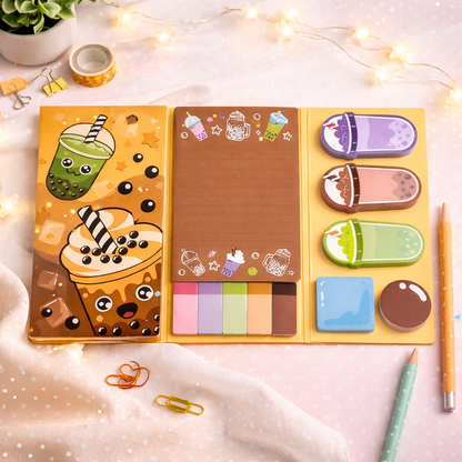 Open foldable sticky notepads with yellow boba tea design, revealing brown lined pages and assorted colorful sticky notes.